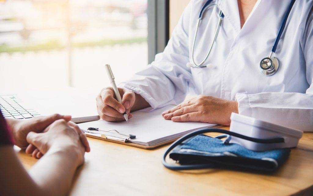 Doctor Is Discussing With The Patient Doctor Is Discussing With The Patient